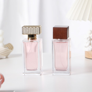 50ml 100ml Wholesale Square Clear Hand Polished Glass Bottle for Perfume with Spray Lid