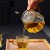 China Supplier 600ML High Borosilicate Handmade Glass Teapot with Color Handle