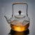 700ml Lifting Beam Hammered Borosilicate Glass Teapot with Copper Handle